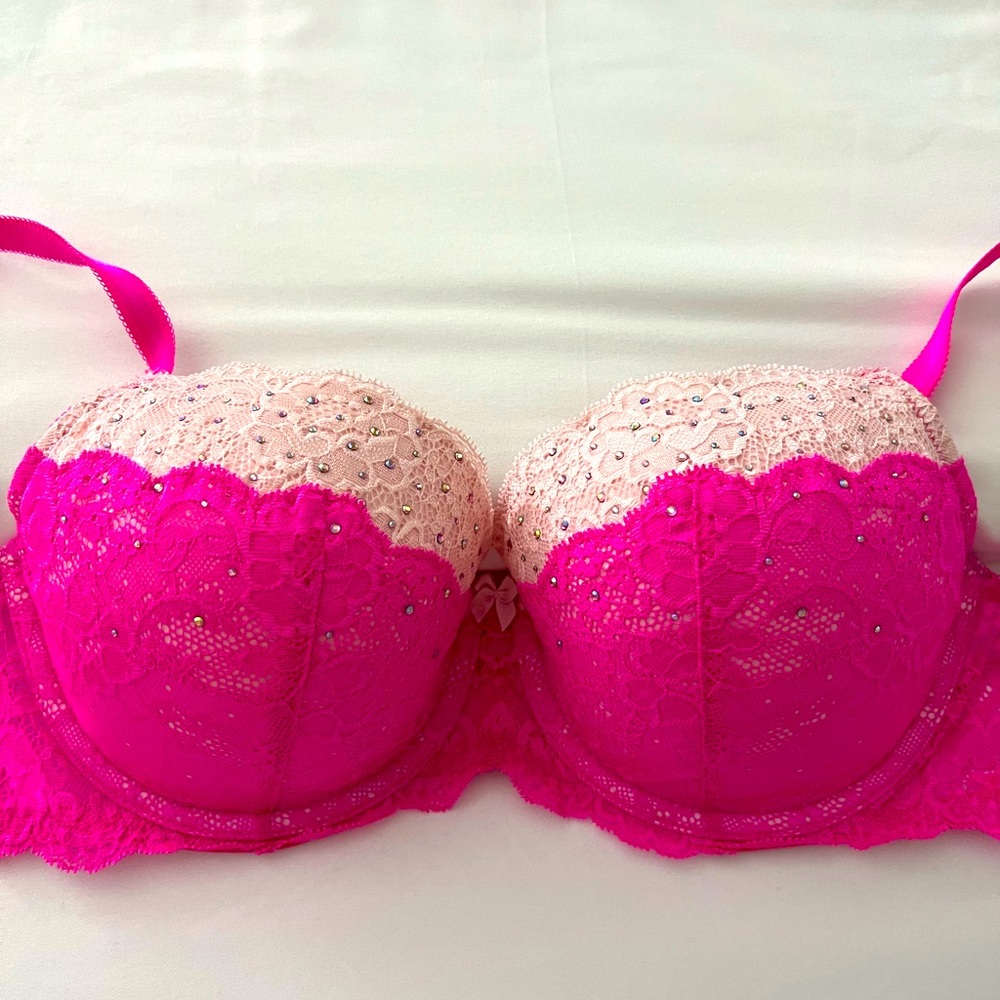 Never worn Victoria Secret bra. Beautiful fuchsia pink with rhinestone detail.